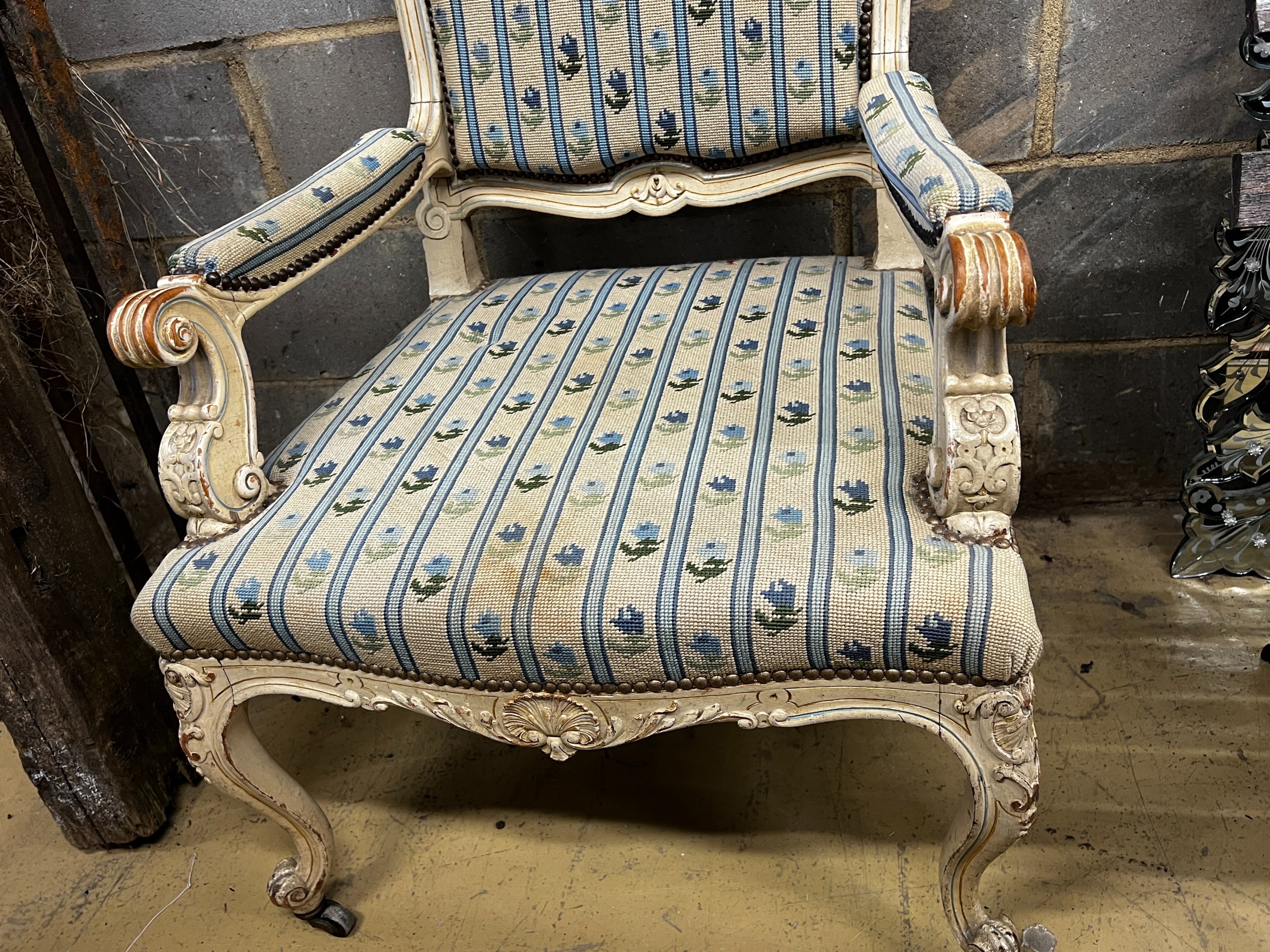 A French painted elbow chair with tapestry upholstery, width 64cm, depth 70cm, height 94cm